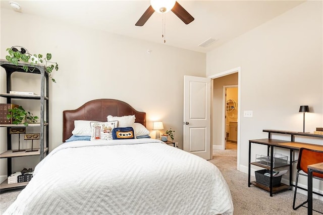 bedroom featuring light carpet, baseboards, and visible vents