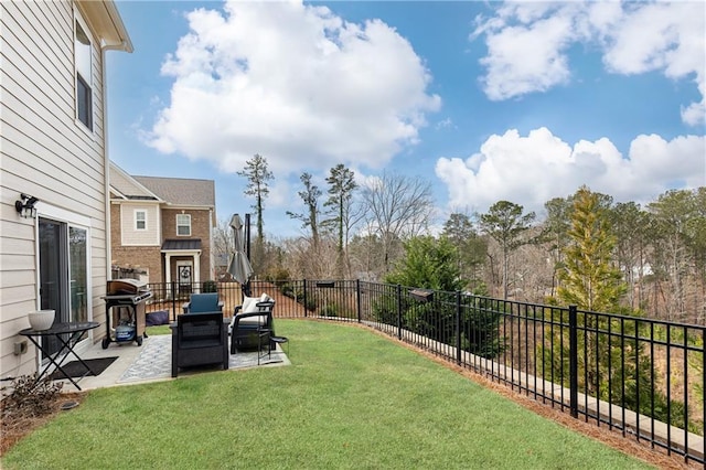 view of yard featuring a patio area, a fenced backyard, and outdoor lounge area