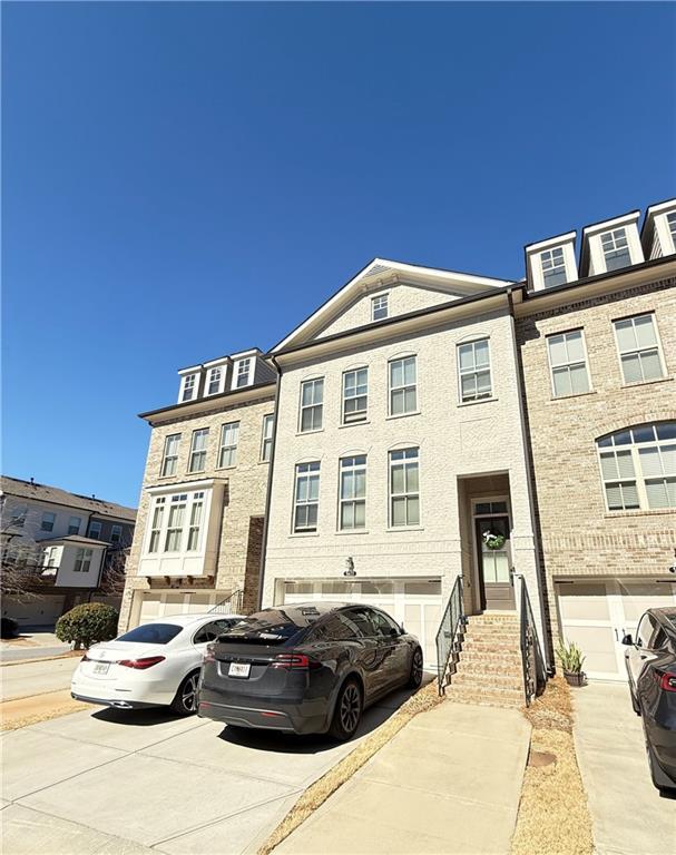 view of property with driveway