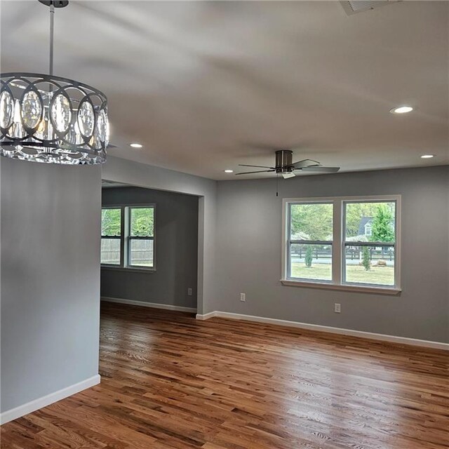 487 Eastside Dr, Dacula, GA 30019 - spare room featuring wood finished floors, baseboards, ceiling fan, and recessed lighting