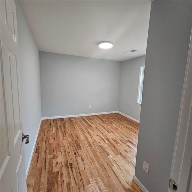 487 Eastside Dr, Dacula, GA 30019 - spare room with light wood finished floors and baseboards