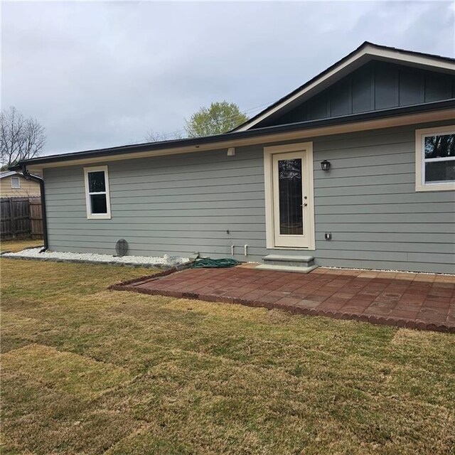 487 Eastside Dr, Dacula, GA 30019 - rear view of property with a patio and board and batten siding