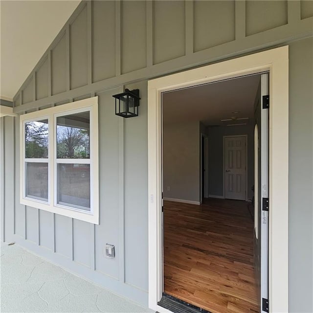 487 Eastside Dr, Dacula, GA 30019 - doorway to property with board and batten siding