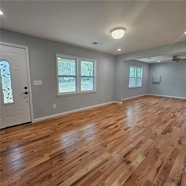 487 Eastside Dr, Dacula, GA 30019 - entryway featuring wood finished floors, baseboards, recessed lighting, and ceiling fan