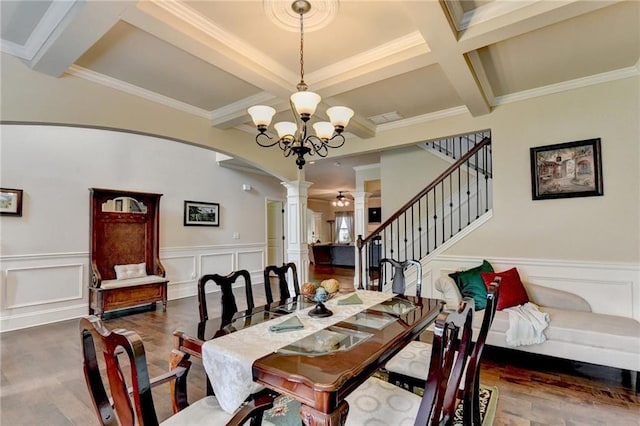 1211 Chapel Estates Way, Dacula, GA 30019 - dining space featuring ornate columns, wood finished floors, coffered ceiling, beam ceiling, and arched walkways