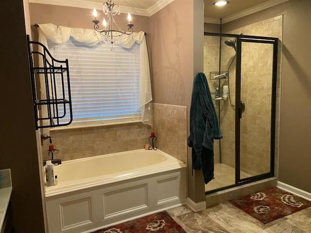 full bath featuring a chandelier, ornamental molding, a stall shower, and a bath