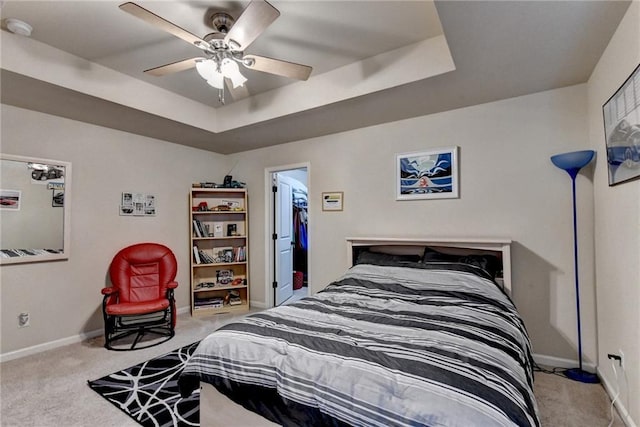 1211 Chapel Estates Way, Dacula, GA 30019 - bedroom with carpet, a raised ceiling, and a ceiling fan