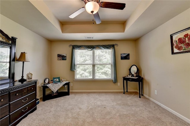 1211 Chapel Estates Way, Dacula, GA 30019 - sitting room featuring a raised ceiling, ceiling fan, and carpet floors