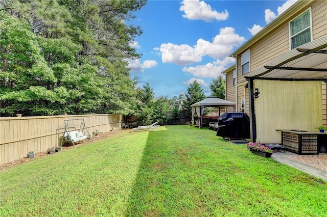 1211 Chapel Estates Way, Dacula, GA 30019 - fenced backyard featuring a gazebo