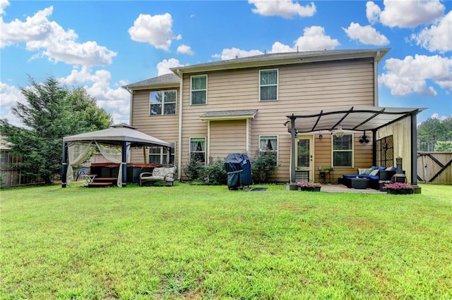 1211 Chapel Estates Way, Dacula, GA 30019 - rear view of house with outdoor lounge area, a gazebo, a pergola, a fenced backyard, and a patio area