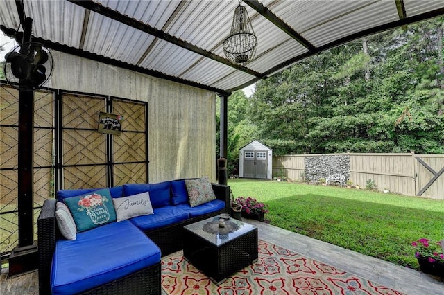 1211 Chapel Estates Way, Dacula, GA 30019 - fenced backyard with outdoor lounge area, a storage shed, and a patio
