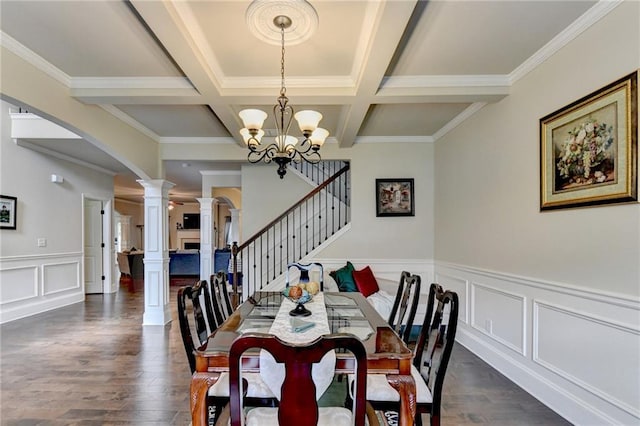 1211 Chapel Estates Way, Dacula, GA 30019 - dining area with ornate columns, a chandelier, dark wood finished floors, beamed ceiling, and a decorative wall
