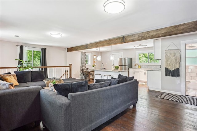 877 Lee Andrews Ave SE, Atlanta, GA 30315 - living area featuring visible vents and dark wood-style floors
