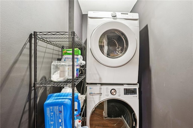 877 Lee Andrews Ave SE, Atlanta, GA 30315 - laundry area featuring stacked washing maching and dryer and laundry area