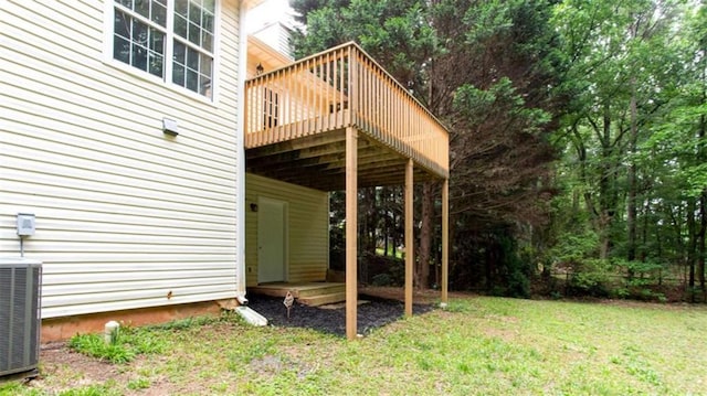 2975 Summit Ln, Monroe, GA 30655 - view of grassy yard featuring a wooden deck and central air condition unit