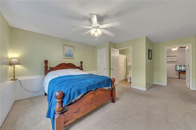 503 Silver Maple Ln, Woodstock, GA 30189 - bedroom with carpet floors, ensuite bathroom, and ceiling fan