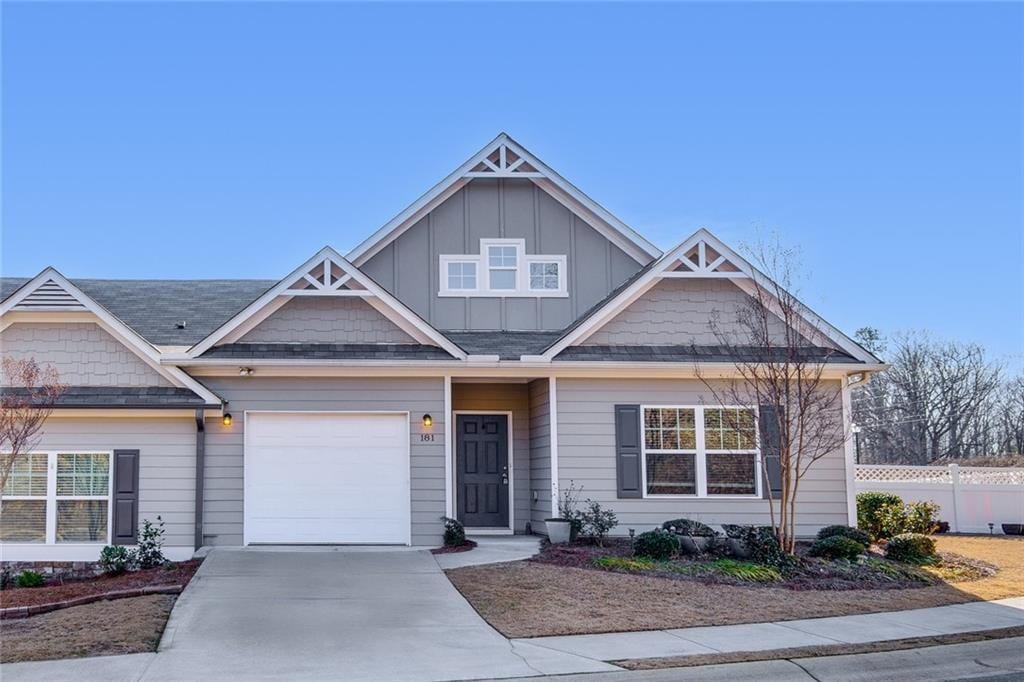 craftsman-style home with a garage