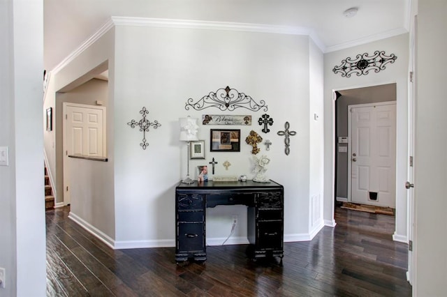 corridor with crown molding and dark hardwood / wood-style flooring