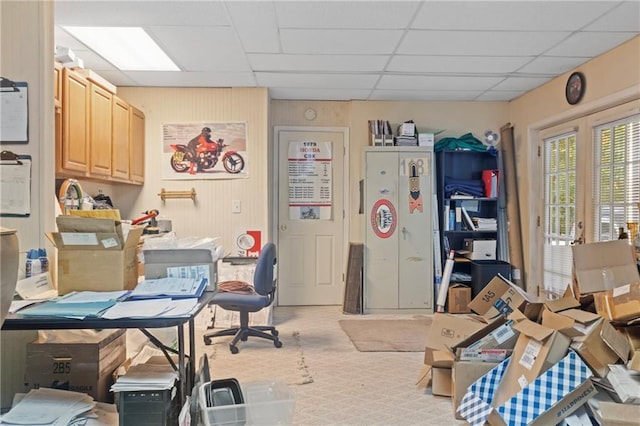 interior space featuring a drop ceiling