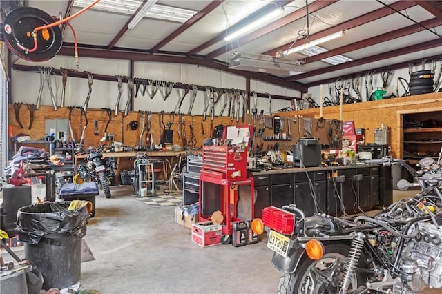 garage with a workshop area