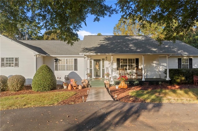 single story home with covered porch