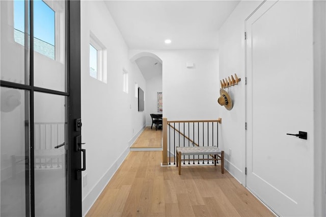 hall with light wood-type flooring