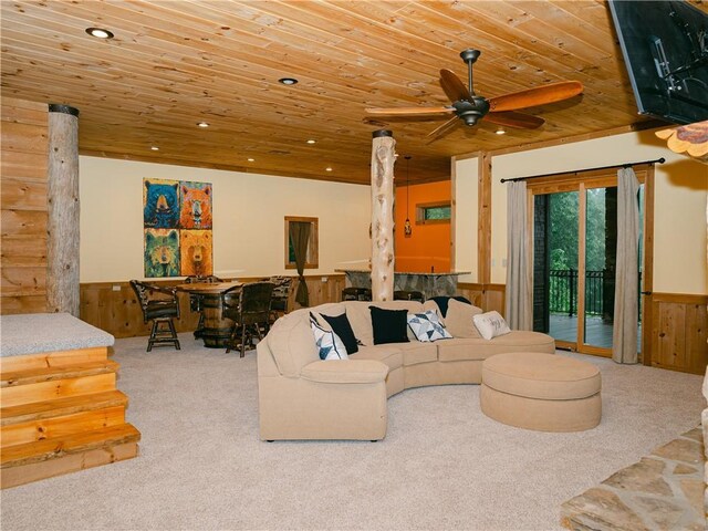 living room featuring wood ceiling, carpet, and ceiling fan