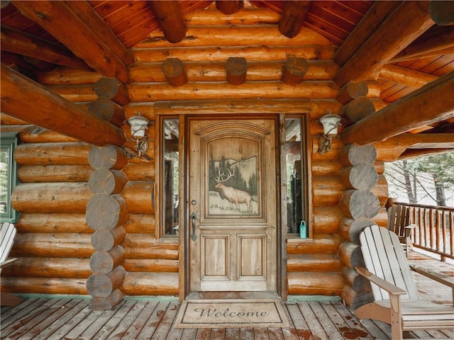 entrance to property with a porch