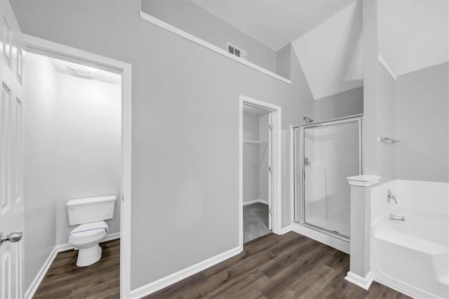 bathroom with toilet, independent shower and bath, lofted ceiling, and wood-type flooring