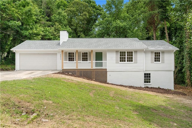 6273 Oak Ridge Dr, Flowery Branch, GA 30542 - single story home featuring covered porch, a front yard, an attached garage, and concrete driveway