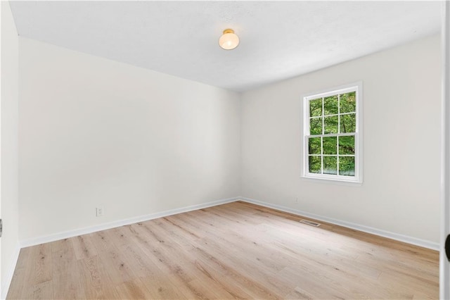 6273 Oak Ridge Dr, Flowery Branch, GA 30542 - empty room featuring wood finished floors and baseboards