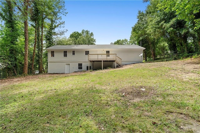 6273 Oak Ridge Dr, Flowery Branch, GA 30542 - rear view of property with a wooden deck