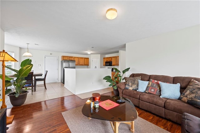 living room with light wood-type flooring