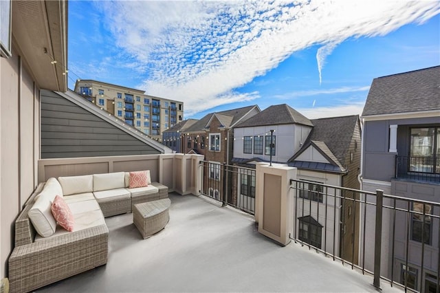 view of patio with a balcony and an outdoor hangout area