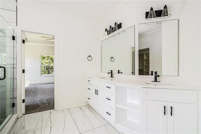 bathroom with ceiling fan, a shower with door, vanity, and ornamental molding