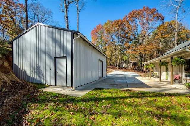 view of outbuilding with a lawn