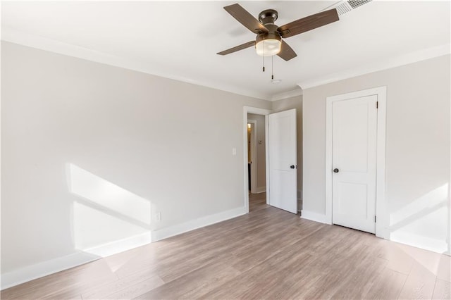 unfurnished bedroom featuring baseboards and light wood finished floors