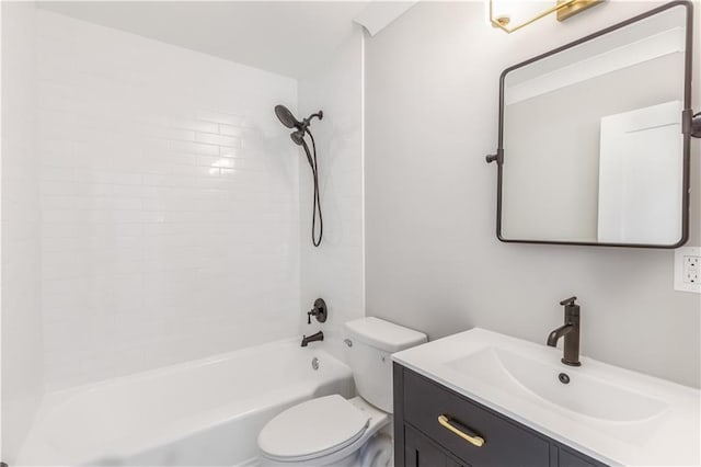 bathroom with toilet, shower / bathing tub combination, and vanity