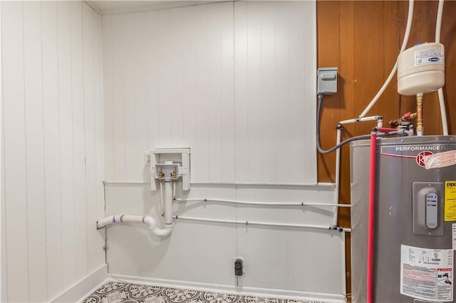 utility room with electric water heater