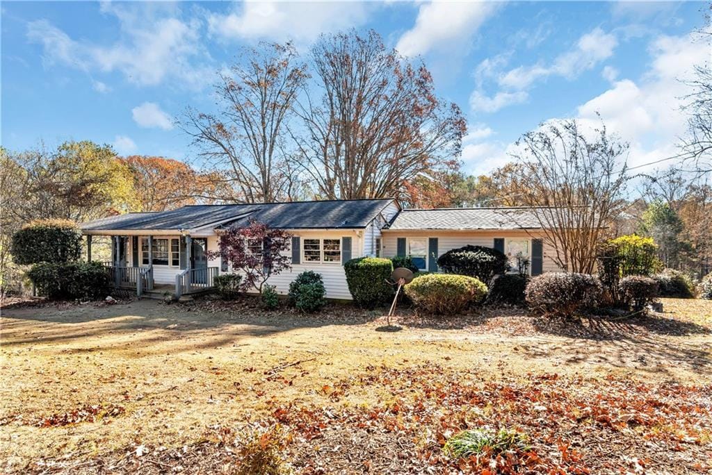 15756 Hopewell Rd, Alpharetta, GA 30004 - view of front facade with a porch