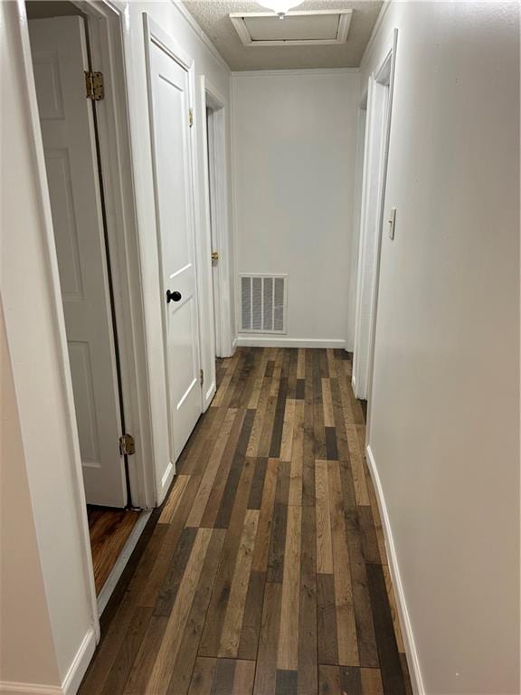 hallway with dark wood-type flooring