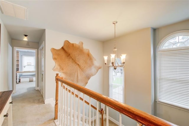 1360 Stampmill Way, Lawrenceville, GA 30043 - corridor with an upstairs landing, light carpet, a chandelier, and baseboards