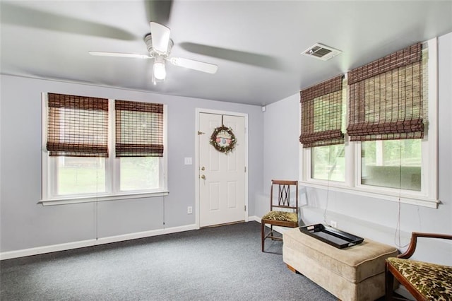 1360 Stampmill Way, Lawrenceville, GA 30043 - carpeted foyer entrance with plenty of natural light, a ceiling fan, and baseboards