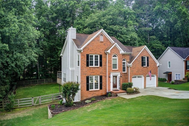 1360 Stampmill Way, Lawrenceville, GA 30043 - view of front of home featuring driveway, brick siding, a chimney, and an attached garage