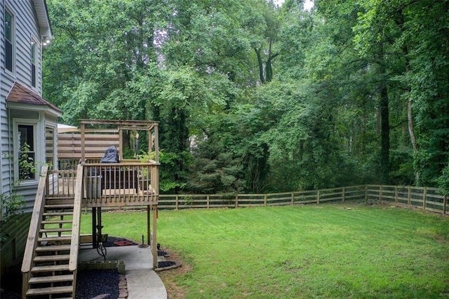 1360 Stampmill Way, Lawrenceville, GA 30043 - view of yard featuring stairs, a wooden deck, and a wooded view