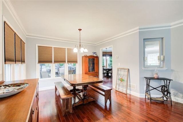1360 Stampmill Way, Lawrenceville, GA 30043 - dining area featuring dark wood-type flooring, a chandelier, ornamental molding, and baseboards