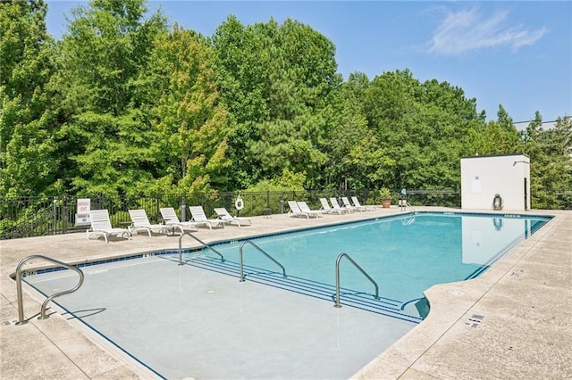 3400 Malone Dr Unit 303, Atlanta, GA 30341 - community pool with a patio area and view of scattered trees