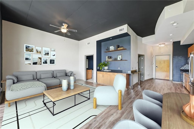 3400 Malone Dr Unit 303, Atlanta, GA 30341 - living room featuring light wood-style flooring and a ceiling fan