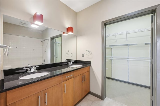 3400 Malone Dr Unit 303, Atlanta, GA 30341 - full bathroom featuring tile patterned floors, double vanity, a walk in closet, and a shower