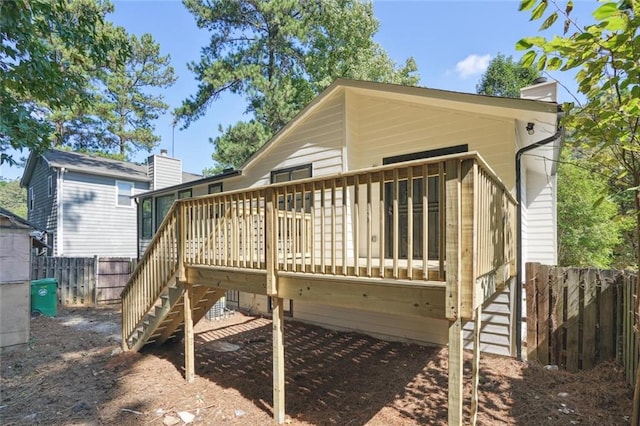 rear view of property with a deck